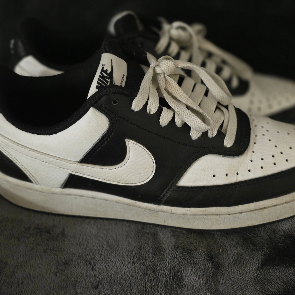 Nike Black and White Leather Sneakers with Classic Design